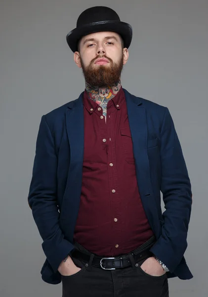 Tattooed male in blue costume — Stock Photo, Image