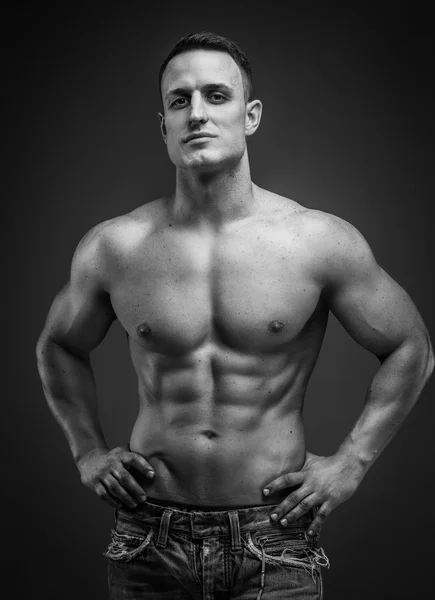 Muscular man show his torso. — Stock Photo, Image