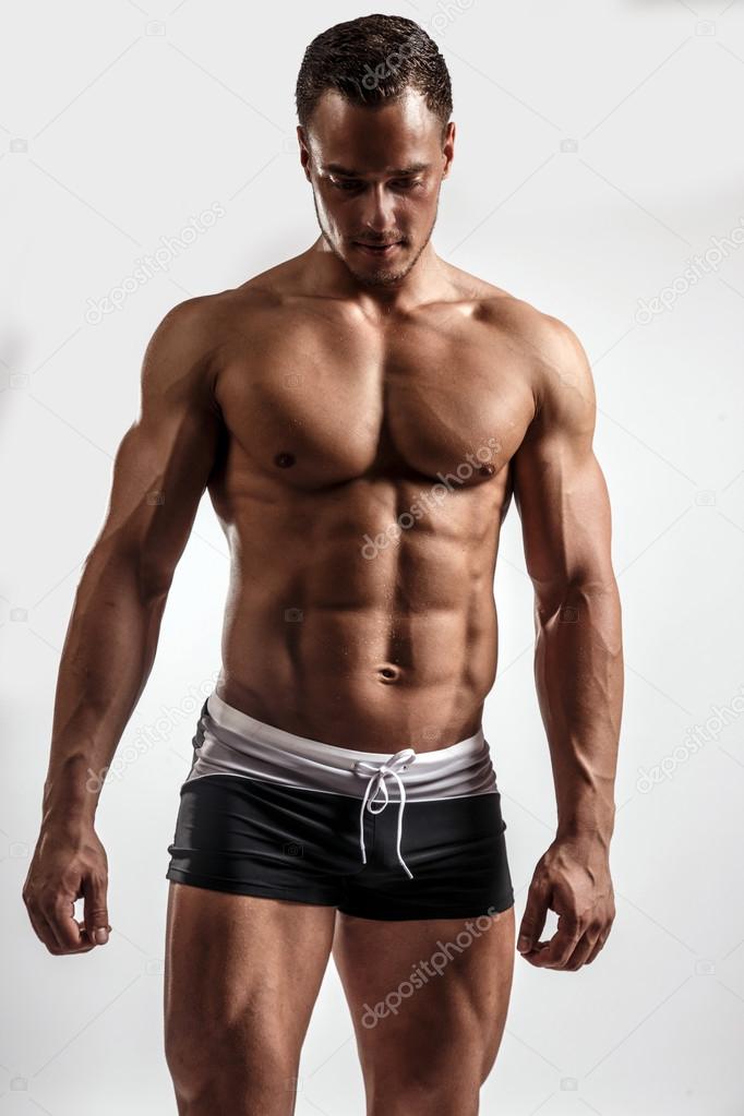 Young guy with great body anatomy. Stock Photo by ©fxquadro 65333305
