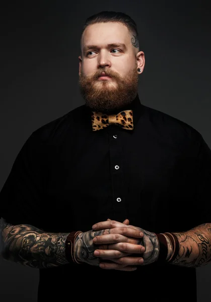 Man in black shirt and bow tie. — Stock Photo, Image