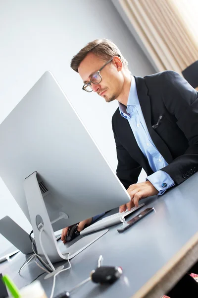 Handsome business man in office. — Stock Photo, Image