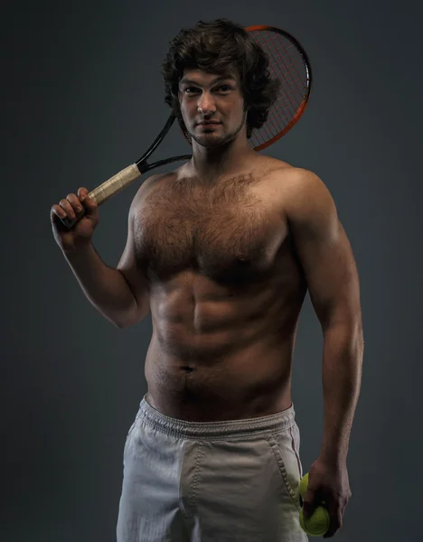 Jugador de tenis masculino con raqueta . — Foto de Stock