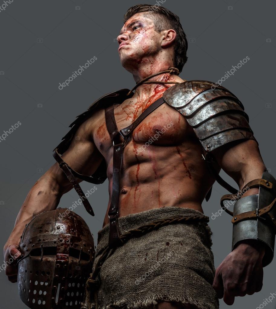 Man in gladiator armor. Stock Photo fxquadro 66175529