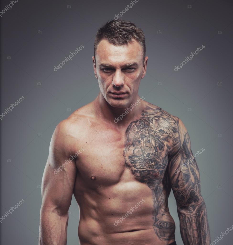 Man with chest tattoo hires stock photography and images  Alamy