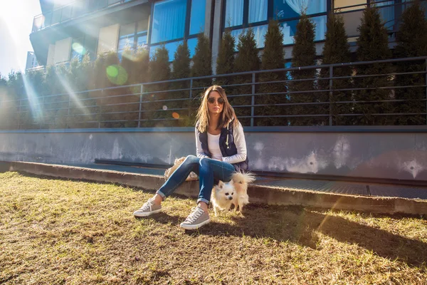 Awesome girl posing with a dog — Stock Photo, Image