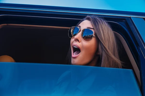 Awesome girl in blue sunglasses — Stock Photo, Image