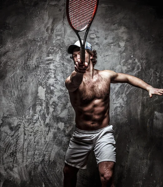 Male with naked torso and tennis racket. Stock Photo by ©fxquadro 66175567