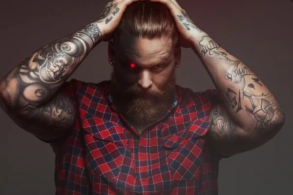 Male with tattoo on arms in studio — Stock Photo, Image