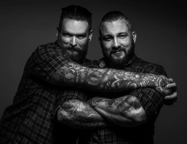 Two males with tattos on arms — Stock Photo, Image