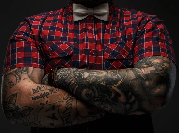 Hipster in red shirt and tattooes. — Stock Photo, Image