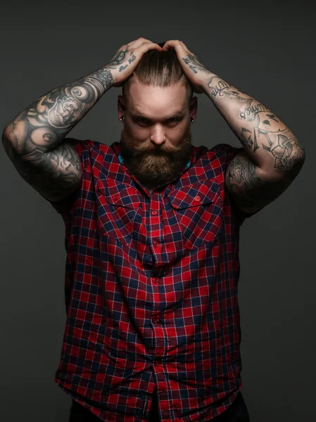 Men with beard and tattos on hands — Stock Photo, Image