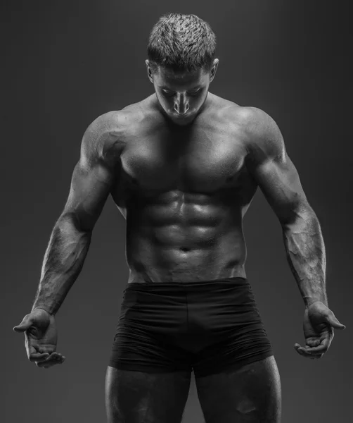 Handsome guy posing in studio — Stock Photo, Image