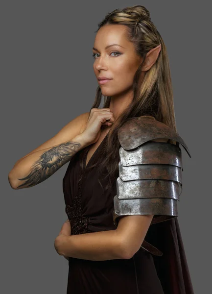 Beautiful elf woman on grey background — Stock Photo, Image