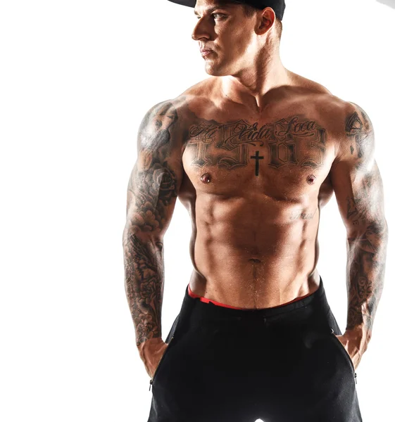 Brutal male with tattooed torso — Stock Photo, Image