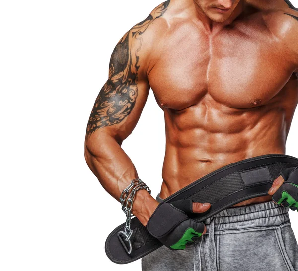 Muscular male holding power weist — Stock Photo, Image