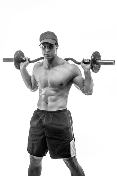 Gespierde man bedrijf barbell — Stockfoto