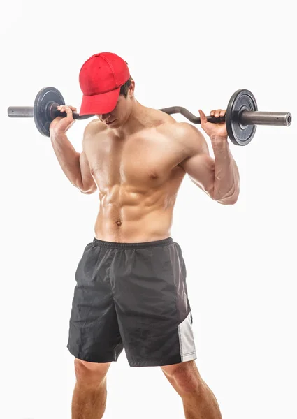 Muscular guy holding barbell — Stock Photo, Image