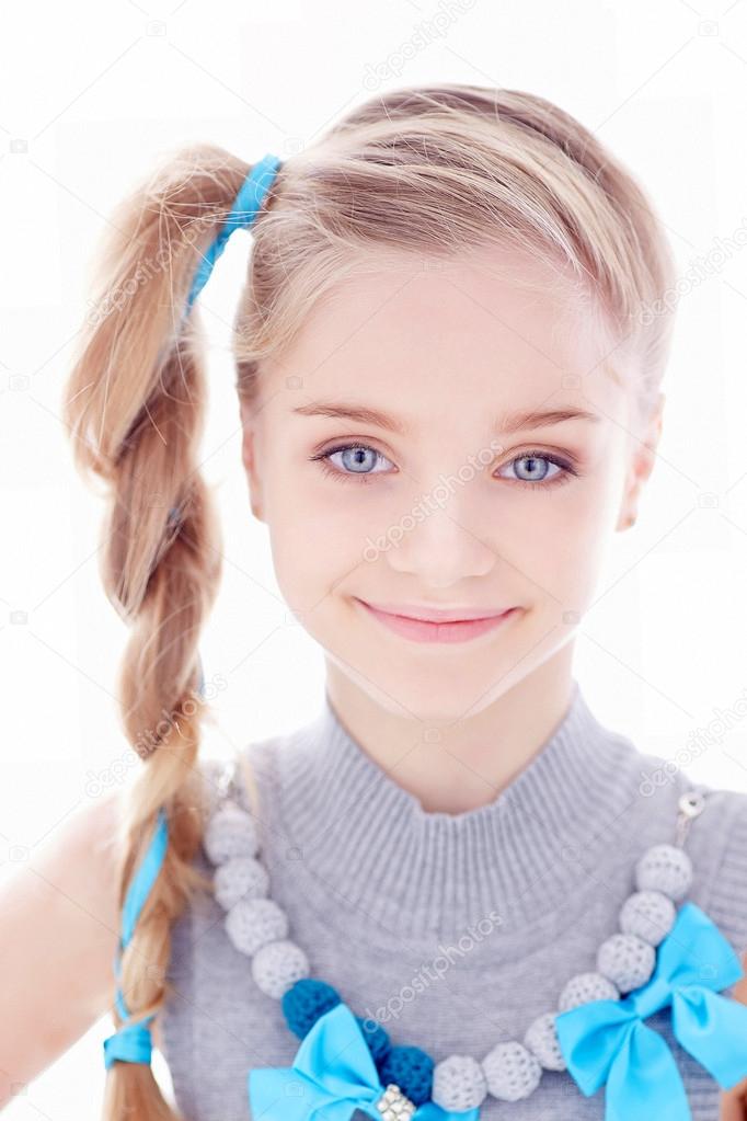 Beautiful little girl on white background