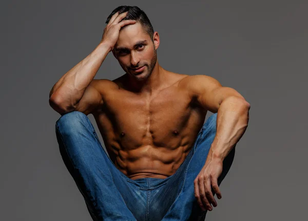 Attractive shirtless guy in blue jeans — Stock Photo, Image