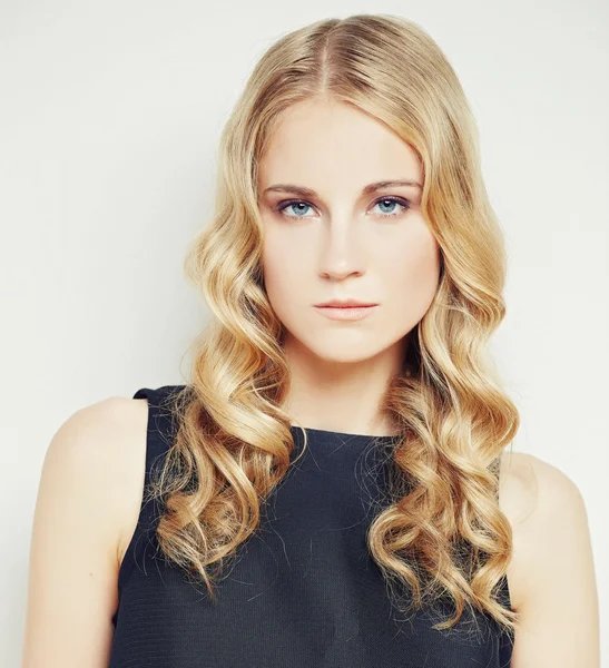 Blond female in black dress — Stock Photo, Image