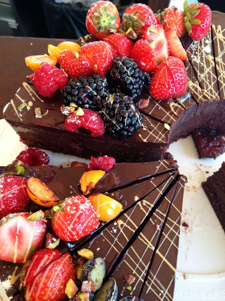 Fruits on chocolate cakes