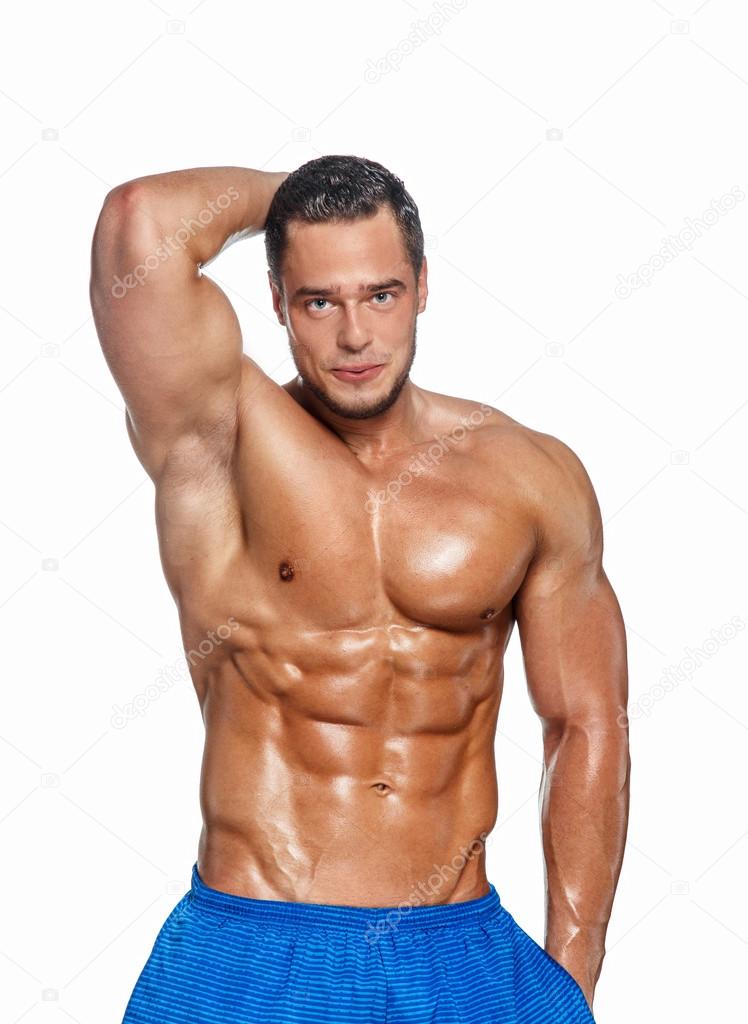 Attractive muscular guy on white background Stock Photo by ©fxquadro 73074459