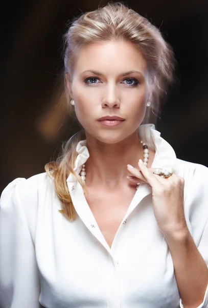 Blond female in white dress — Stock Photo, Image