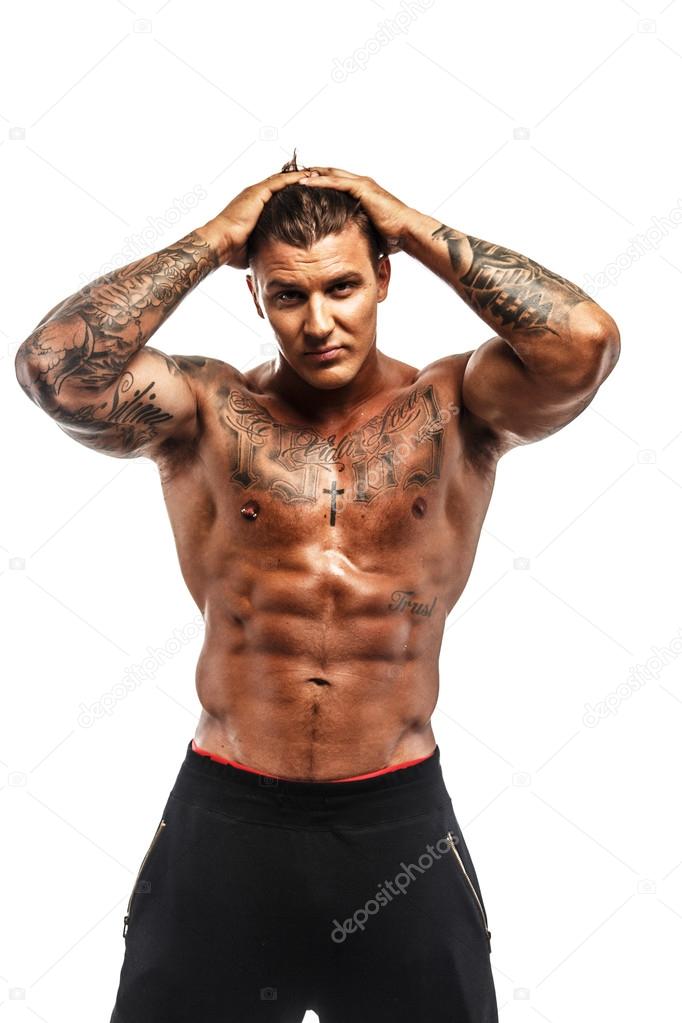 Awesome muscular man with tattoo