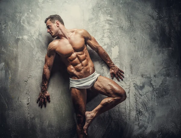 Homem muscular de calcinha branca — Fotografia de Stock