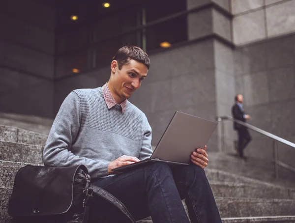 Happy man on stairs — Stock Photo, Image