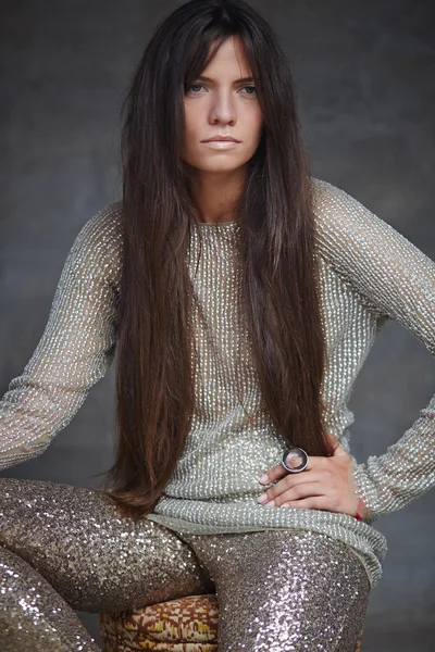 Young woman in shine clothes — Stock Photo, Image