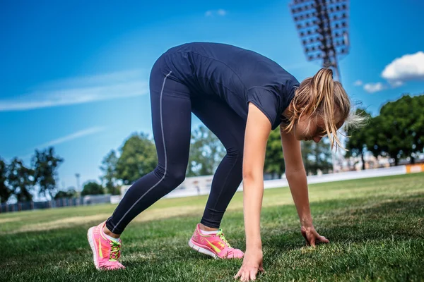 Female on running track. — ストック写真