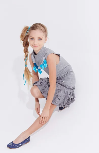 Cute little girl with long hair — Stock Photo, Image