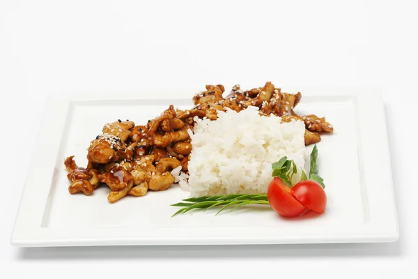 Rice with meat and herbs on white plate — Stock Photo, Image