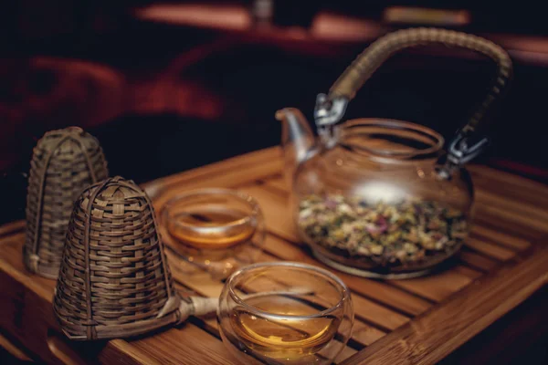 Glass teapot and two cups. — Stock Photo, Image