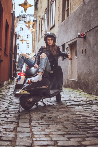 Casual female on moto scooter — Stock Photo, Image