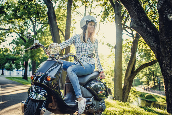 Casual blond female in blue jeans and t shirt.