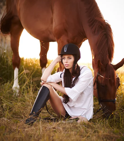 Woman in helmet and in white jacket — Stock Photo, Image