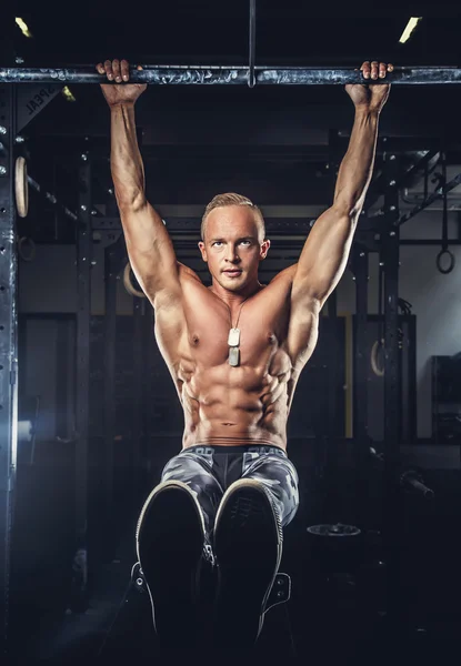 Shirtless muscular man in military pants. — Stock Image Shirtless muscular man in military pants. Stock Photo