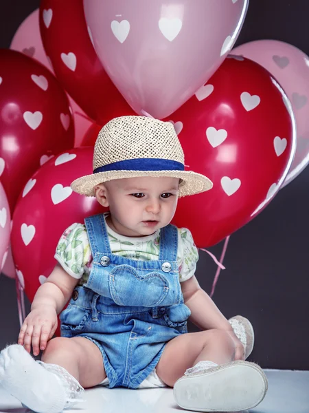 Little child and balloons. — Stock Photo, Image