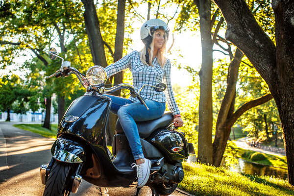 Awesome blond female in jeans and shirt.