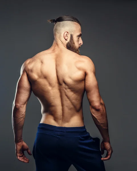 Shirtless bodybuilder's back. — Stock Photo, Image