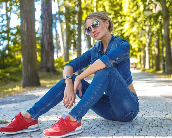 Cute girl in jeans costume — Stock Photo, Image