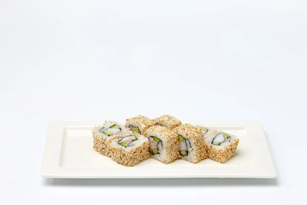 Sushi em placa branca . — Fotografia de Stock