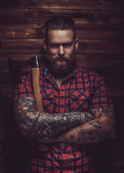 Brutal man with beard and tattooe. — Stock Photo, Image