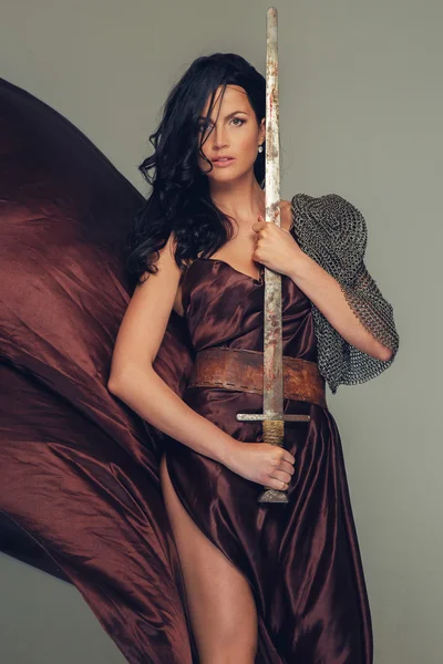 Awesome female in ancient armor. — Stock Photo, Image