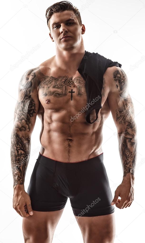 Shirtless tattooed man.