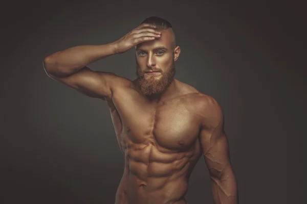 Muscular bearded man.