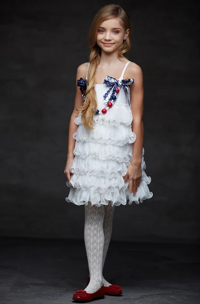 Young girl in white dress — Stock Photo, Image