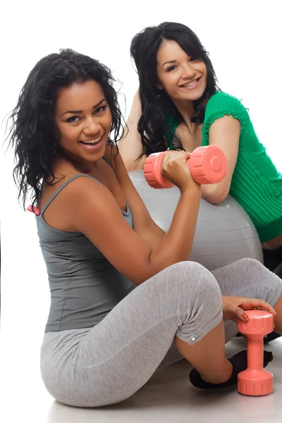 Two smiling woman in sportswea. — Stock Photo, Image